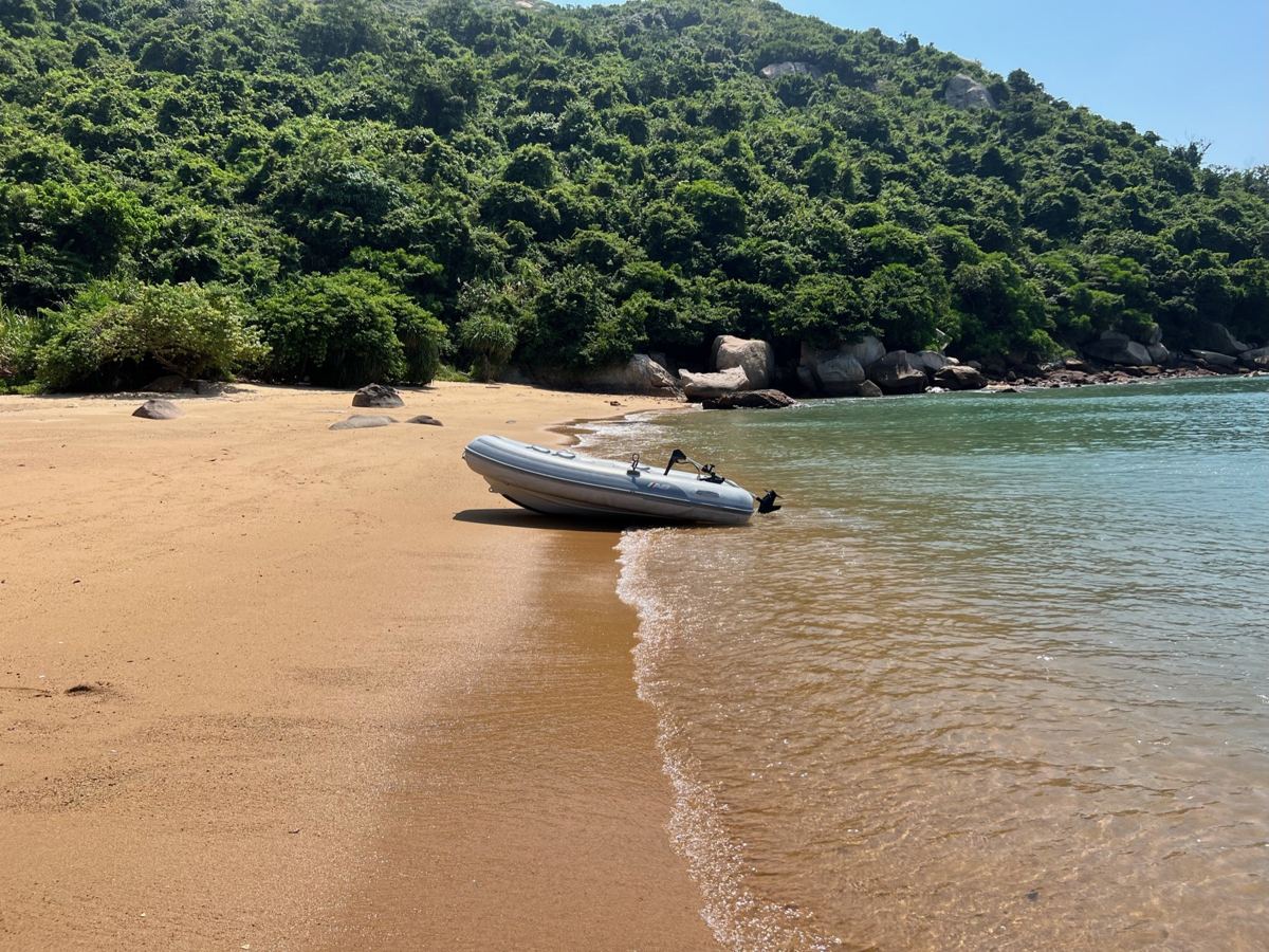 The tender pulled up on a quiet sandy beach